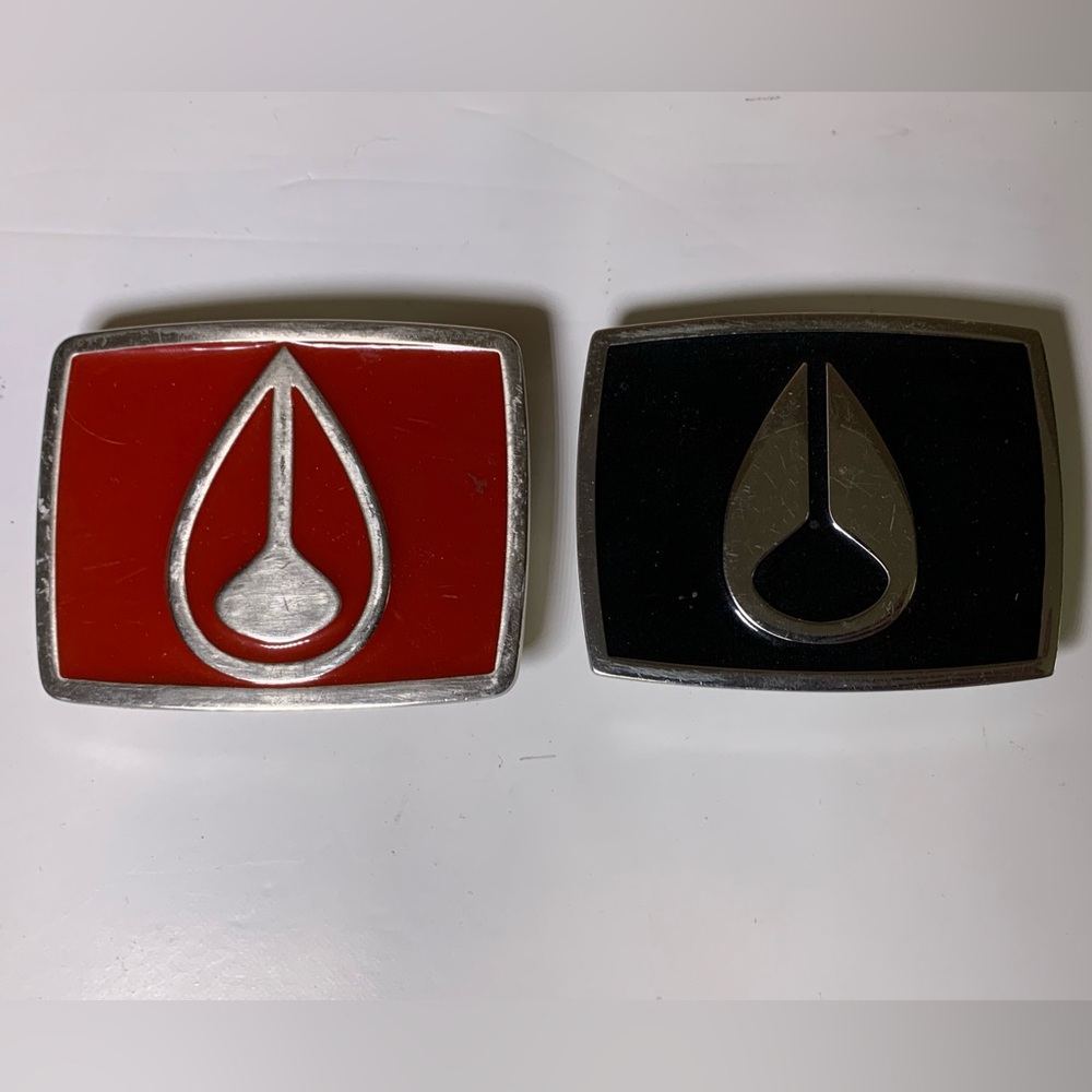 Set of Nixon Red and Black Belt buckles